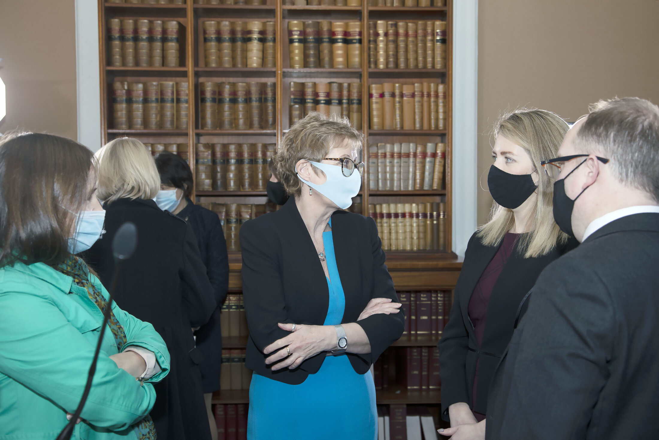 CLC Director, Paddy Kelly, with CLC Solicitors Maria McCloskey and Barbara Muldoon, talking to Mr Justice Scoffield